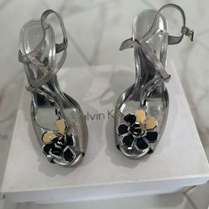 Parina textures metallic silver sandals.